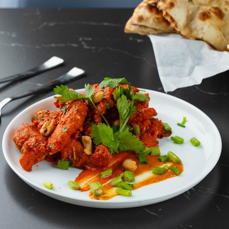 Spicy marinated fish with herbs and scallions.