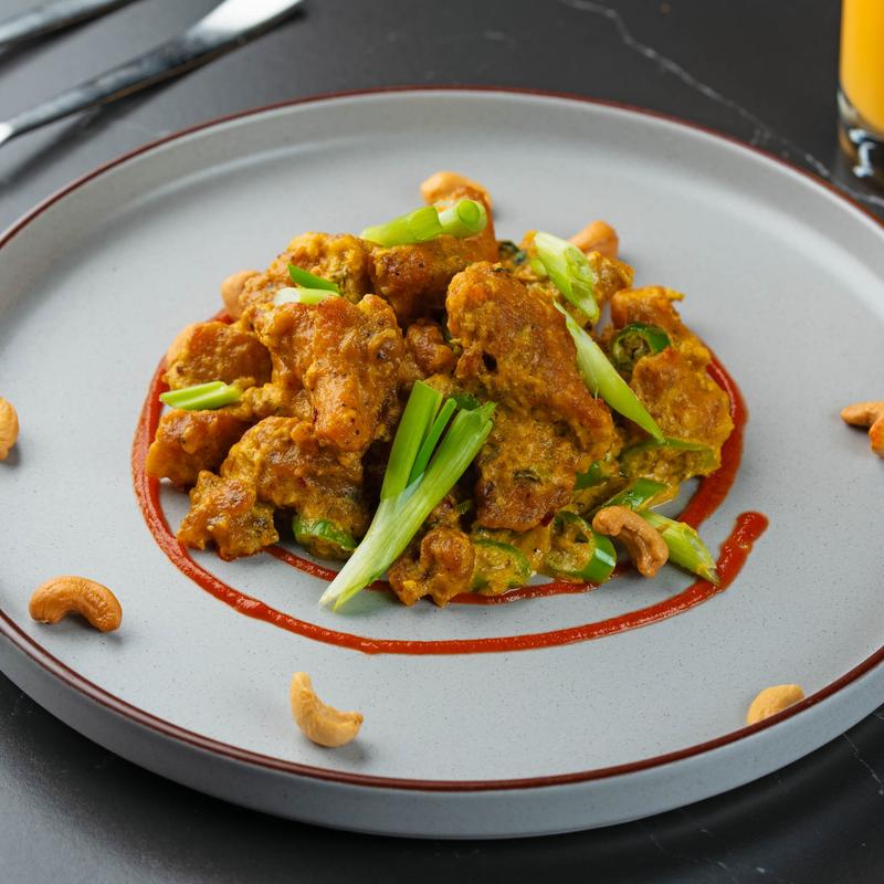 Marinated fish with scallions.