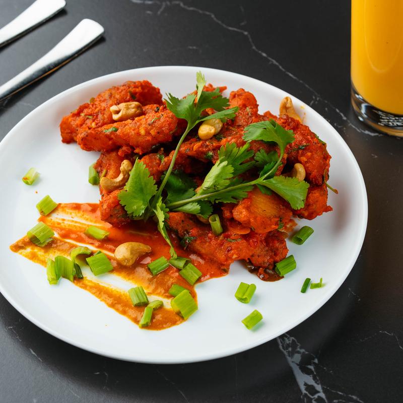 Spicy fish with herbs.